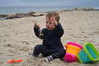 Nora enjoying the sand